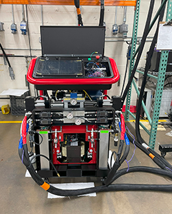 PMC Premier Mach 2 proportioner being quality tested before shipping.